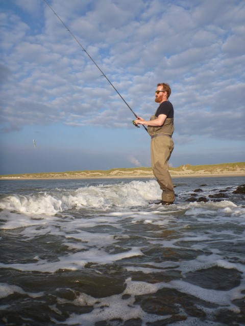 Kunstaasvissen vanaf het strand